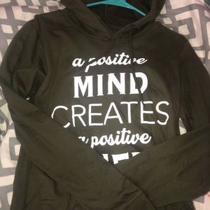 A olive green hoodie